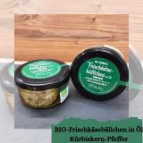Frischkäsebällchen in Öl Kürbiskerne Pfeffer